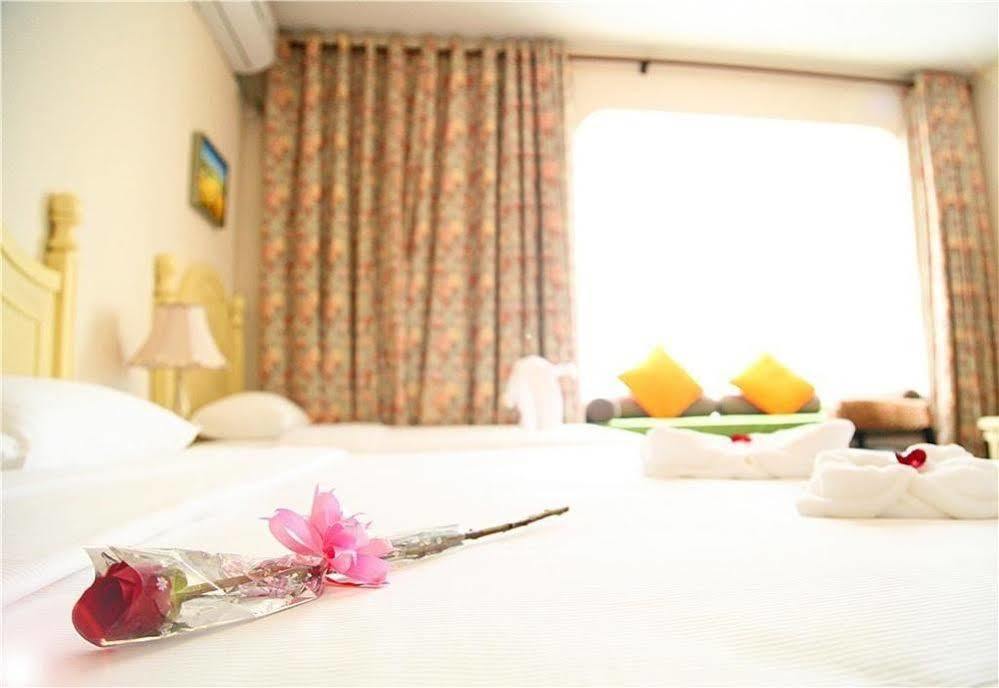 Lingshui Shenzhou Holiday Hotel Buitenkant foto