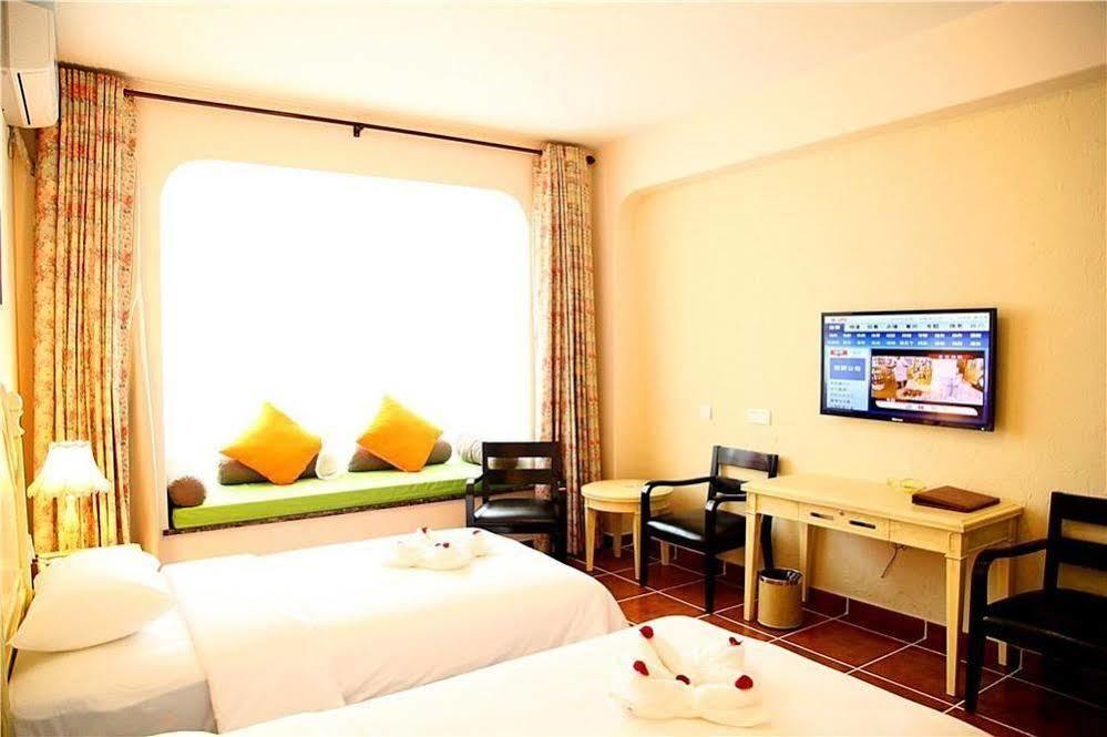 Lingshui Shenzhou Holiday Hotel Buitenkant foto