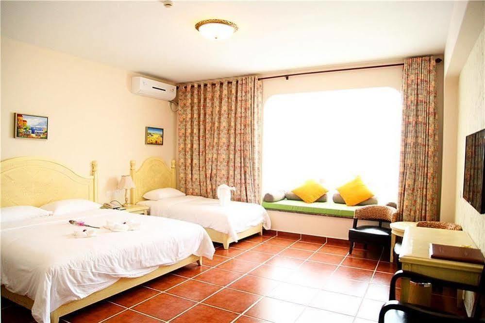 Lingshui Shenzhou Holiday Hotel Buitenkant foto
